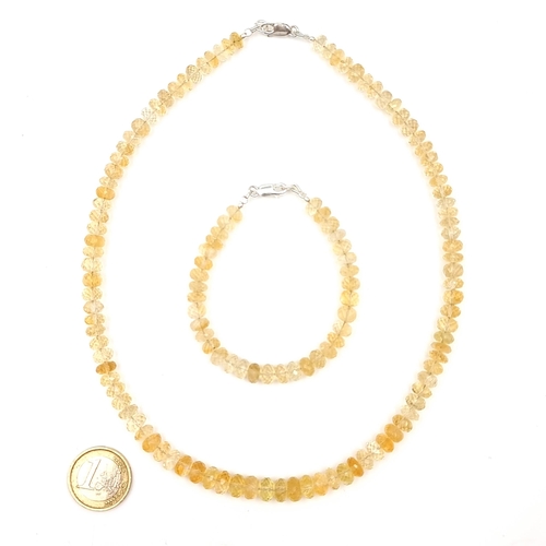 510 - A beautiful and generous suite of natural Citrine, comprising of a graduating stone necklace and mat... 