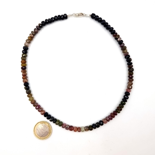 519 - A pretty gem stone necklace, featuring 90 carats of multi-colours natural gem stones. Including rubi... 