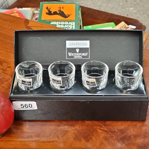 560 - Four John Rocha at Waterford Crystal shot glasses in the Geo pattern. Housed in original presentatio... 