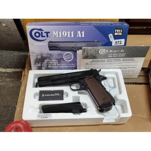 572 - As new airsoft Colt M1911 A1 pistol in original packaging with BB bullets and additional magazine. R... 