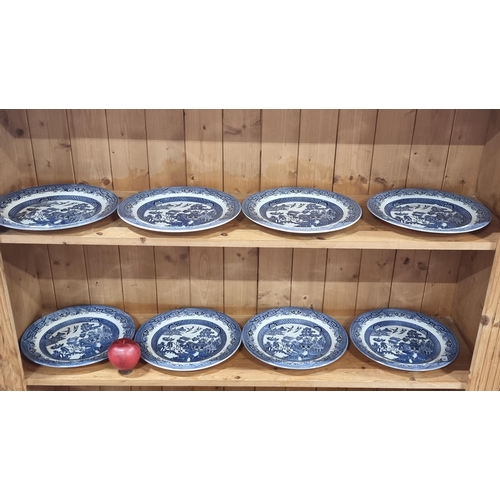 585 - Eight classic china plates from Churchill England. Each in the classic blue and white 