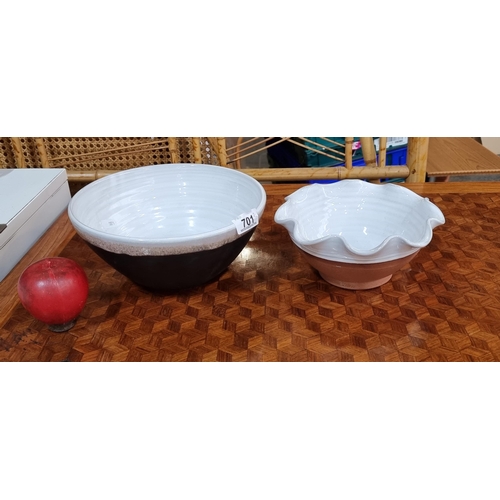 701 - Two example of Stephen Pearce pottery including a fruit bowl in a charcoal glaze and a smaller examp... 