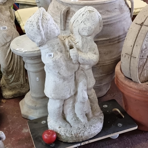 706 - A delightful very heavy reconstituted stone garden sculpture of two children playing in the rain. MM... 