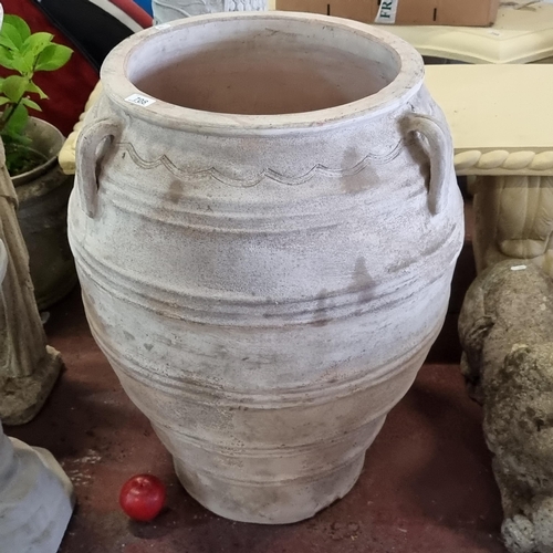 708 - A very large and impressive very heavy reconstituted stone garden planter in the form of an urn with... 