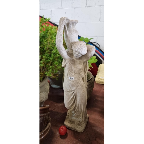 709 - Star Lot: A tall and very heavy reconstituted stone garden sculpture in the form of a Grecian woman ... 