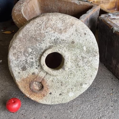 713 - An incredible, very heavy antique early 18th century mill stone/grinding wheel. A heavy quality anti... 