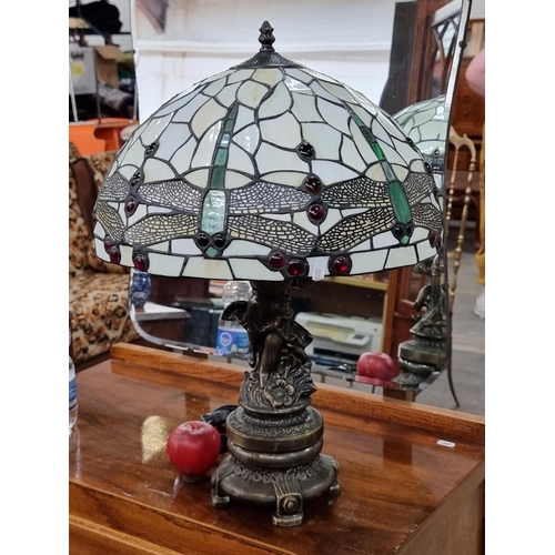 637 - Star Lot : A large beautiful example of a Tiffany style table lamp. Featuring a very heavy brass fig... 