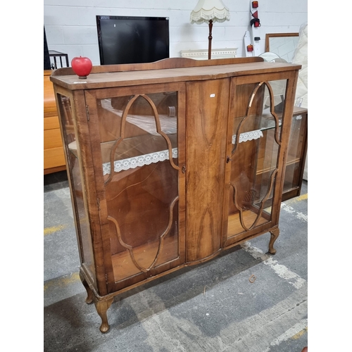 661 - An antique display cabinet with Art Deco elements such as a burled walnut front section and subtle b... 