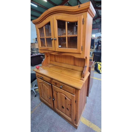 798 - A charming solid oak kitchen dresser with glass-fronted cupboard to top holding a single shelf to in... 