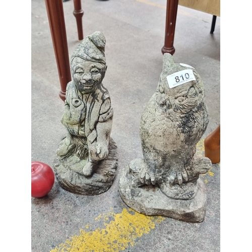 810 - Two heavy garden statues made of reconstituted stone, one of a wise owl the other a characterful gno... 