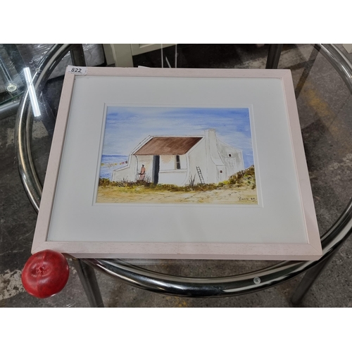 822 - An original watercolour and pencil painting featuring a limewashed cottage in a coastal setting. Sig... 