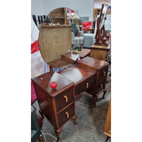 769 - A fabulous vintage mid century dressing table with large circular mirror to top, and five drawers fe... 