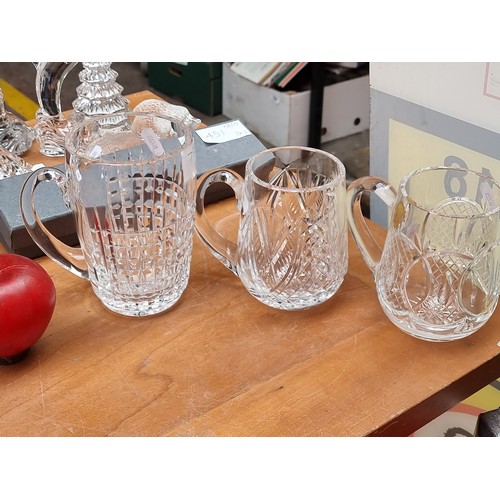 794 - Selection of three Waterford Crystal tankards featuring intricate designs with internet comps of $59... 