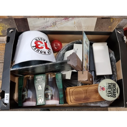 692 - A good collection of bar items including Guinness tray and glasses, and Orchard Thieves fish eye, a ... 