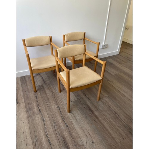 621 - A set of three chic mid-century Ercol  chairs with lovely turned pine frames cushion to seat and bac... 