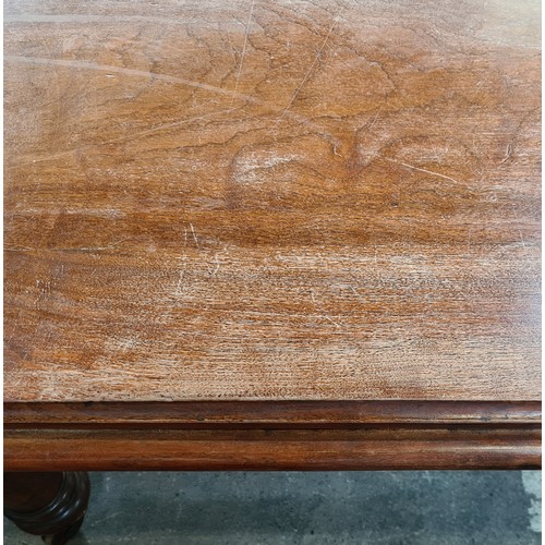 786 - Star Lot : A Super golden Oak Victorian Dining table, With round thick legs and a curved border a ve... 