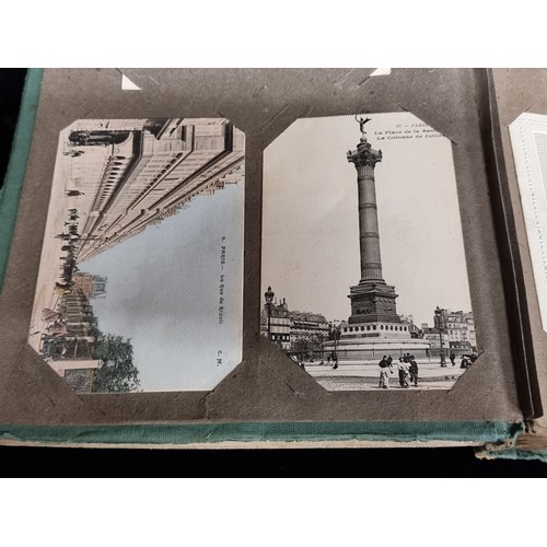 606 - A beautiful vintage postcard album holding a large variety of postcards depicting popular tourist de... 