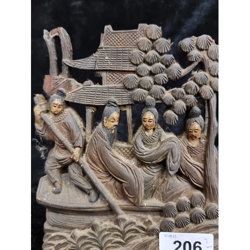 206 - A very unique pair of antique Chinese bookends. Lavishly carved with a traditional scene of elegantl... 