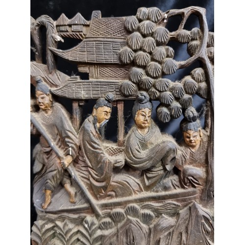 206 - A very unique pair of antique Chinese bookends. Lavishly carved with a traditional scene of elegantl... 