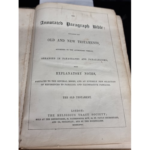 259 - An antique hardback book tilted The Annotated Paragraph Bible containing both the old and new testam... 