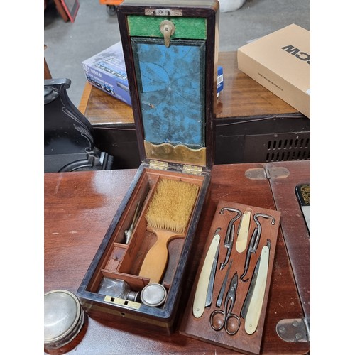 480 - Star lot - A beautiful Gentlemen's vanity set. Consisting of a polished rosewood box with brass cart... 