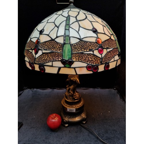 637 - Star Lot : A large beautiful example of a Tiffany style table lamp. Featuring a very heavy brass fig... 