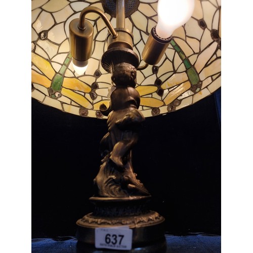 637 - Star Lot : A large beautiful example of a Tiffany style table lamp. Featuring a very heavy brass fig... 