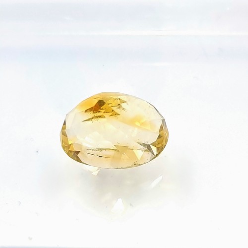 431 - A certified fine example of a a fabulous Citrine stone, of a large 25.60 carats. Comes with a certif... 