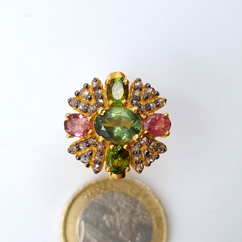 5 - Star Lot : A very pretty example of a natural Green and Pink Tourmaline cluster ring, featuring a  s... 