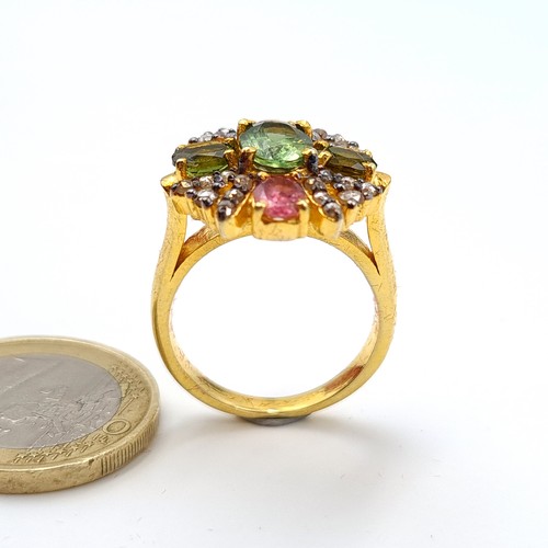 5 - Star Lot : A very pretty example of a natural Green and Pink Tourmaline cluster ring, featuring a  s... 