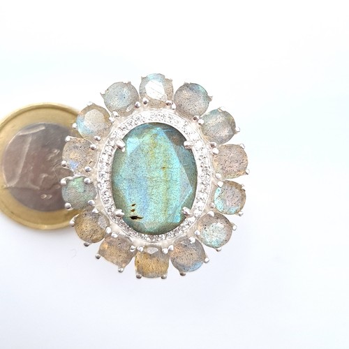 17 - A very pretty 10 gram Labrodite gem stone ring, featuring iridescent natural cut gem stones. Mounted... 