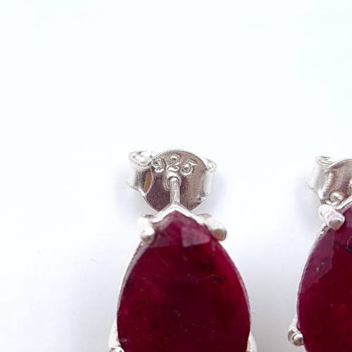 19 - Star Lot : A generous 14 gram tear drop cut natural Ruby earrings, featuring a pretty drop design an... 