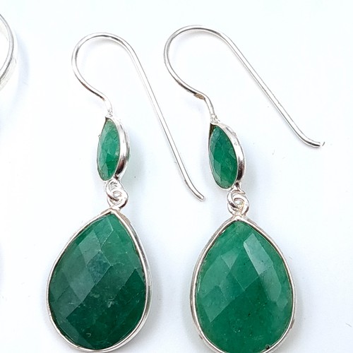 20 - A suite of Emerald jewellery, comprising of a pair of sterling silver tear drop earrings and a prett... 