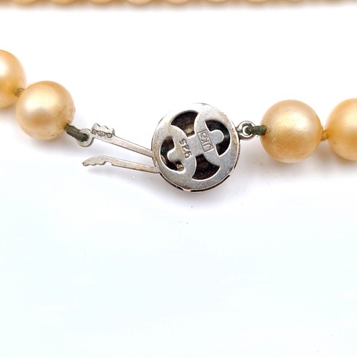 45 - A collection of two stylish faux vintage pearl necklaces, each featuring sterling silver clasps. Dou... 