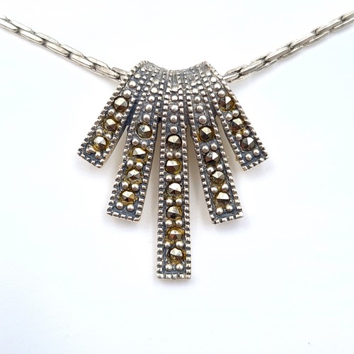 51 - A very pretty Marcasite set pendant, featuring a thick block link sterling silver chain. Length: 40c... 