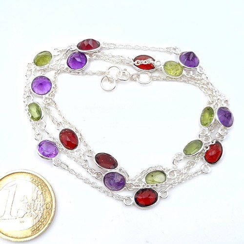 515 - A very attractive gem stone necklace, featuring beautiful Amethyst, Peridot and Garnet natural gem s... 