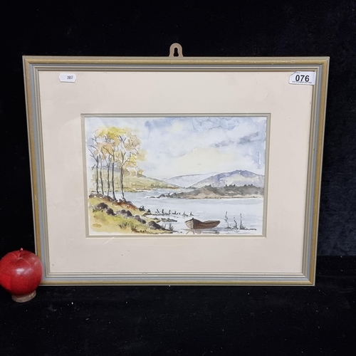 76 - An original watercolour on paper painting showing a landscape scene of a row boat moored at the bank... 