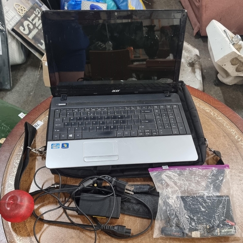 709 - An ACER branded personal laptop. With a Core i3 processor and Windows 7. Including a DVD reader. Cha... 