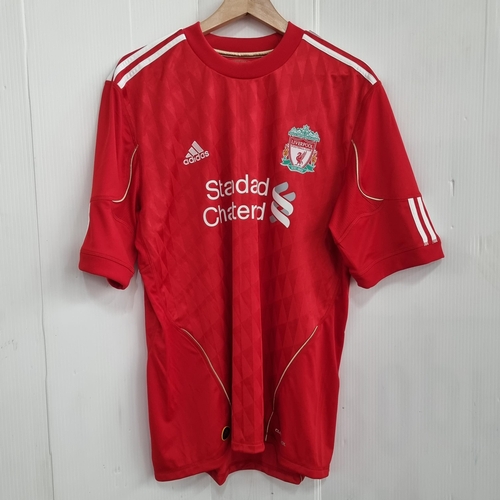 718 - A genuine  Liverpool Football Club jersey in size L.