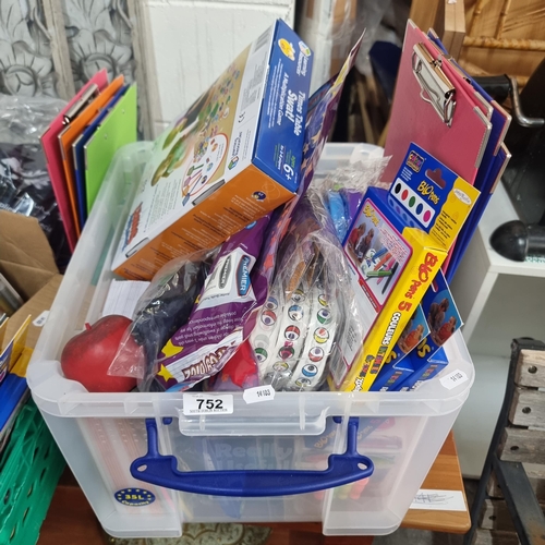 752 - A large box filled to the brim with brand new stationary equipment and office supplies. Including cl... 