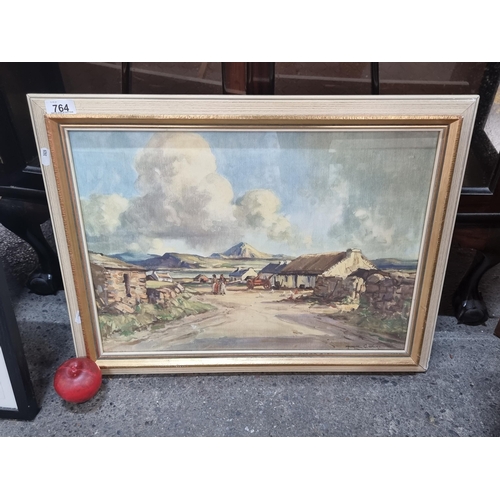 764 - A print of a painting originally by the artist Maurice Canning Wilks titled 'Errigal' and housed in ... 