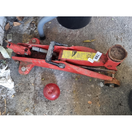 789 - A hydraulic trolley jack in red made by Hilka. No pole