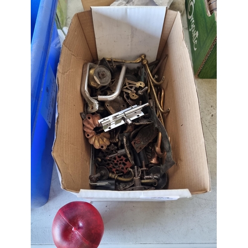 791 - A box filled with antique and vintage handles and fittings including some beautiful ornate brass exa... 