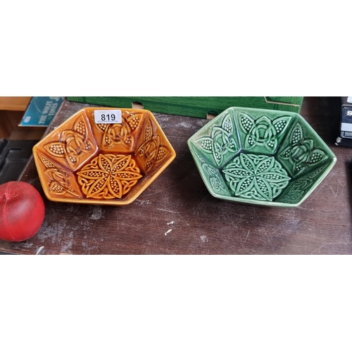 819 - Two vintage Arklow Pottery bowls each in a hexagonal form. The orange example marked 