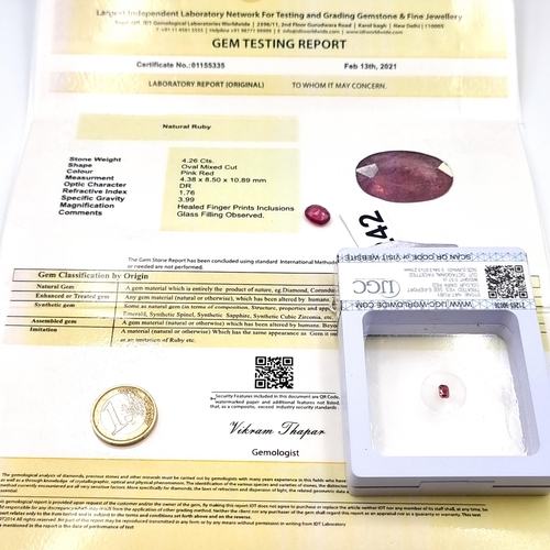 846 - Two certified gem stones, including a deeply hued natural Ruby of .057 carats. Together with a furth... 