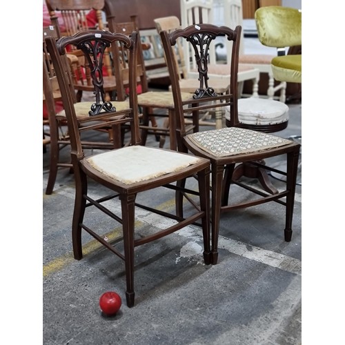 856 - A pair of early Edwardian, walnut salon chairs. Both with slim, elegant frame and delicate string in... 