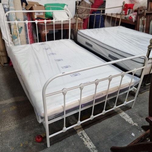 855 - A charming double bed with rod metal frame topped with white finish and accompanying brand new Sleep... 