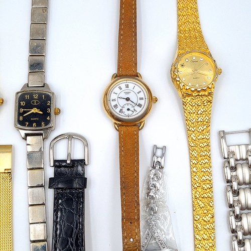 7 - A large and assorted collection of ladies and gentleman's wrist watches, comprising of modern-vintag... 