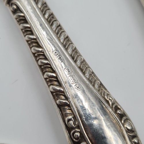 15 - A fine collection of six silver handled butter knives, each featuring fabulous profuse foliate and s... 