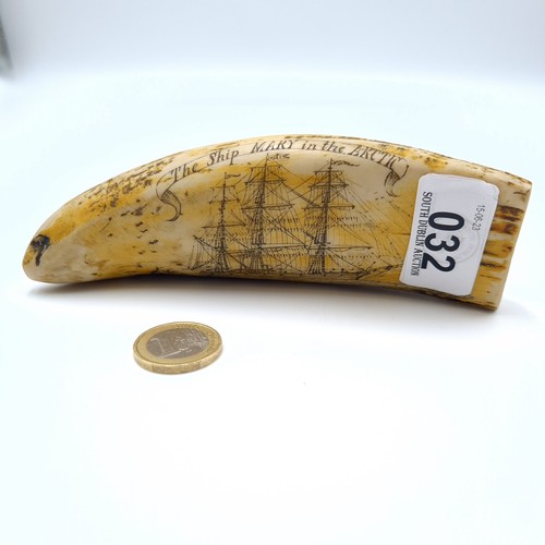 32 - A fine example of an antique repro scrimshaw Whale tooth, with hand carved depictions entitled 